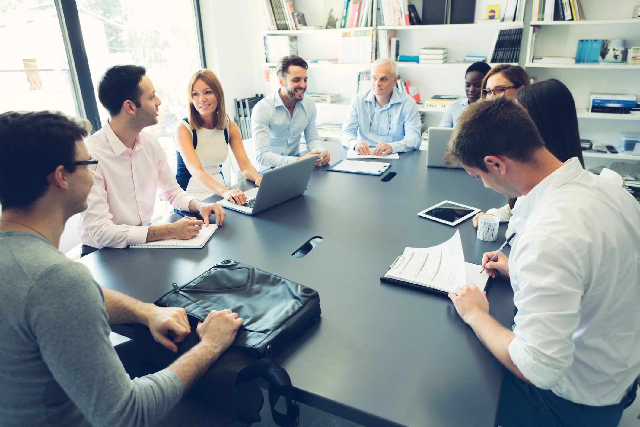 Political editorial team discussing current affairs