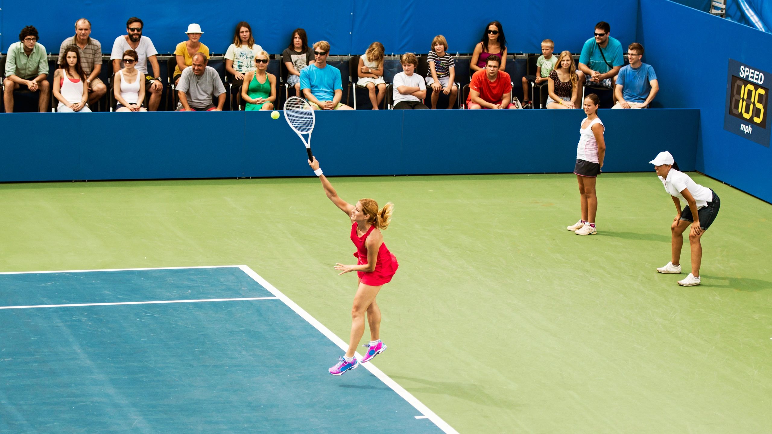 Packed sports venue during live competition